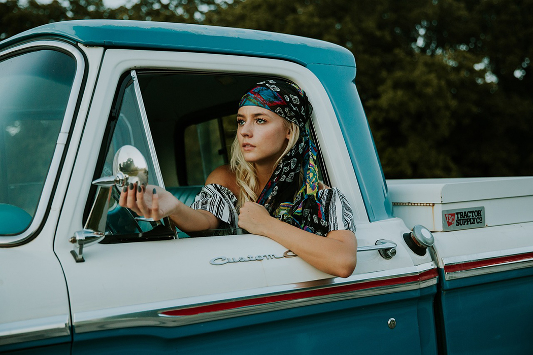 women driving a truck