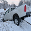 truck slid into a ditch due to snow