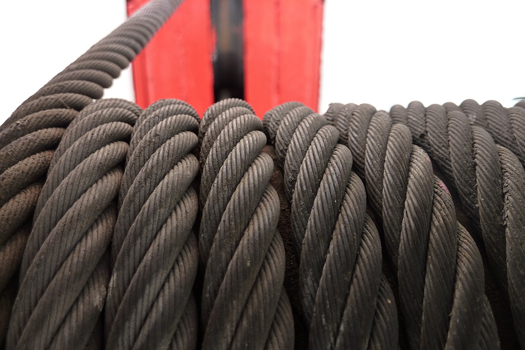 close up picture of metal rope electric winch