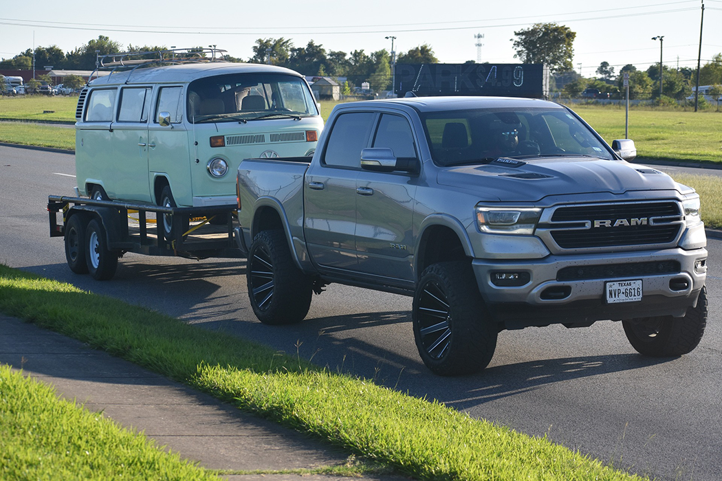 dodge ram towing a volkswagen van on a flatbed